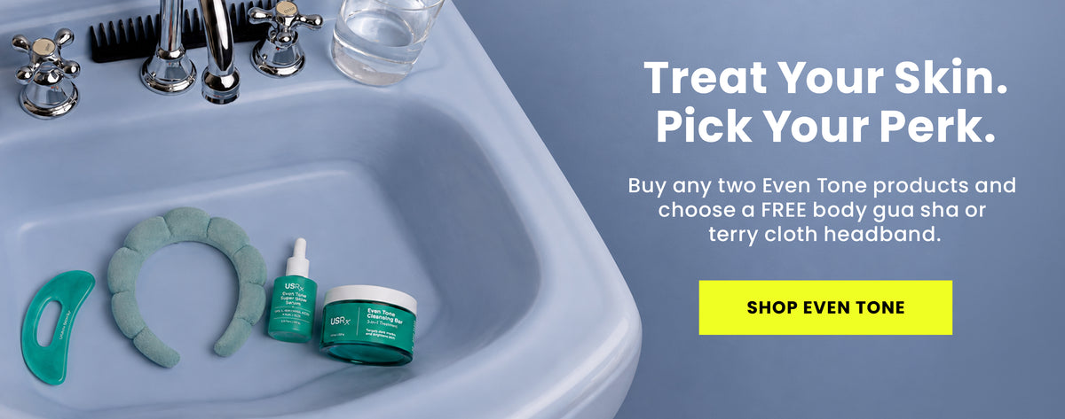 USRx Even Tone Super Serum and Cleansing Bar in a blue bathroom sink with a light blue headband and gua sha tool and promotional text "Shop Even Tone"