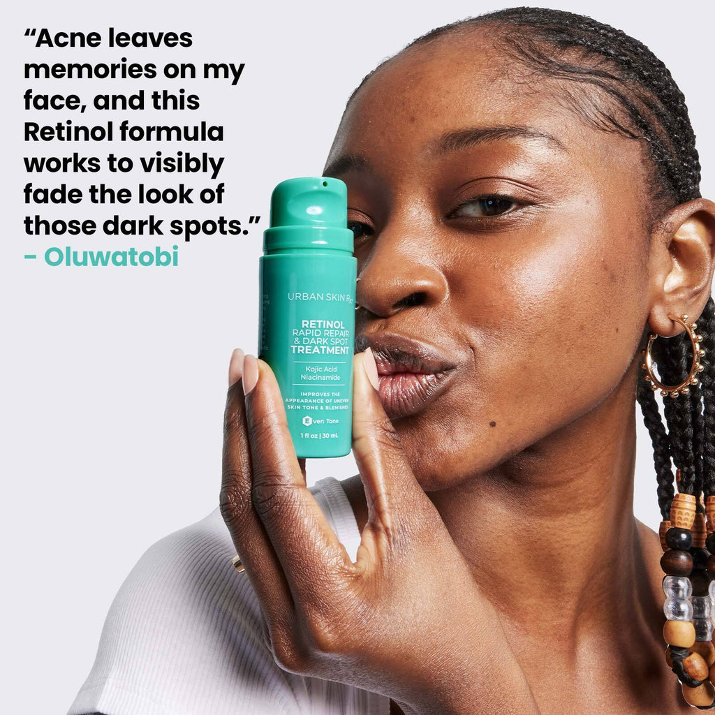 Woman holding bottle of USRX Retinol Rapid Repair & Dark Spot Treatment