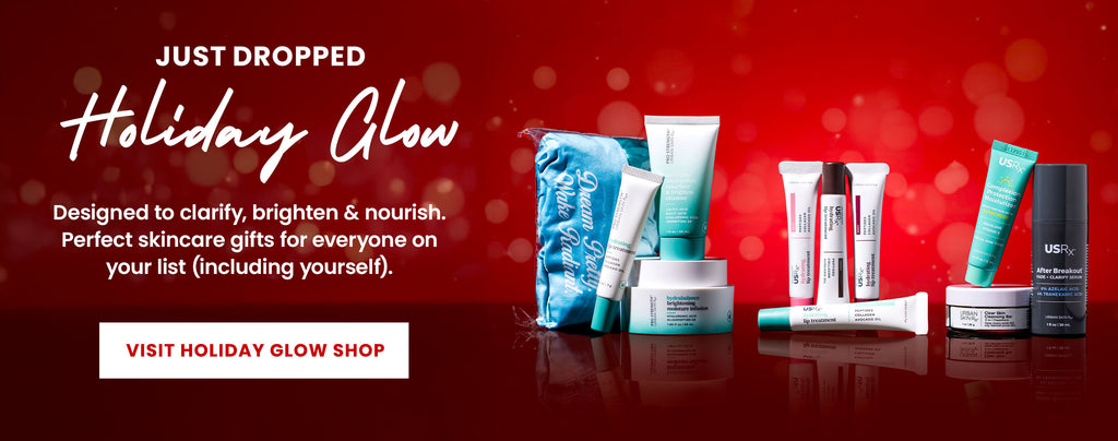 Assortment of USRx Holiday Skincare Gift Sets on a red background