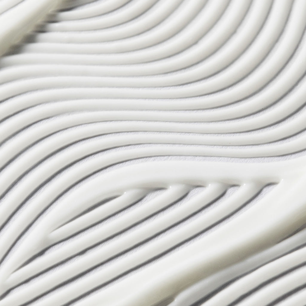 Swatch of USRx complexion protection moisturizer on white background