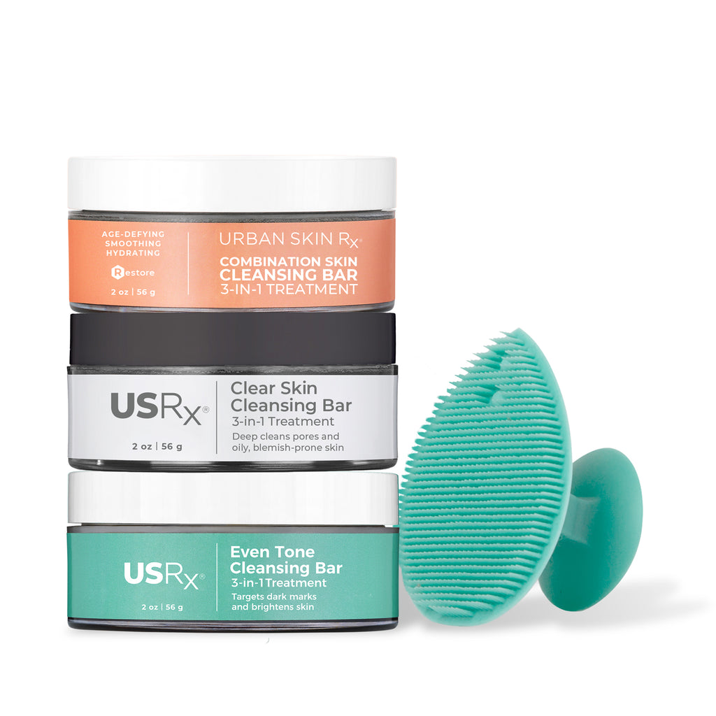 USRx cleansing bars with a green scrubber on a white background