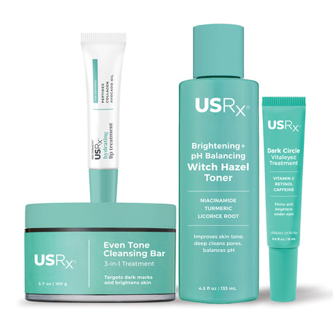 Set of four USRx skincare products on a white background