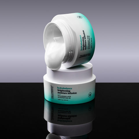 Two jars of USRx Hydrabalance Moisturizer against a neutral background