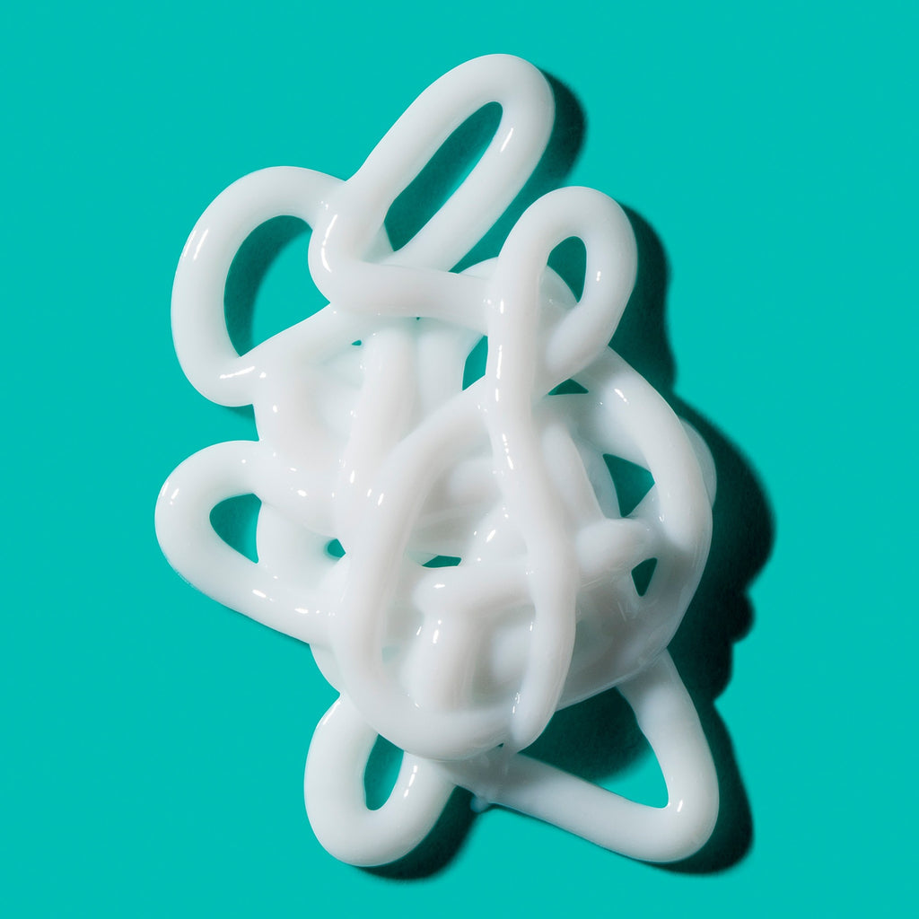 Swatch of USRx VitalEyez Treatment against a light blue background