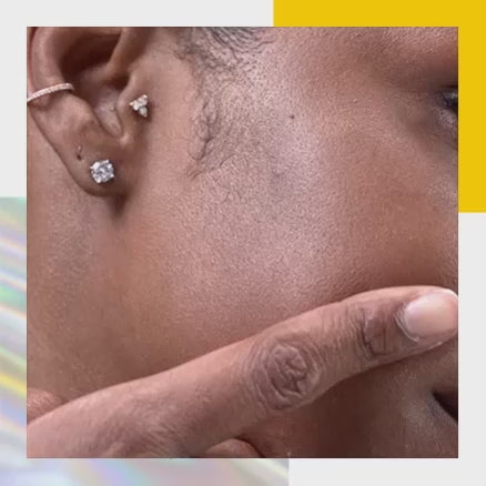 Woman applying USRx Sheerglow to her face
