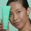 Woman using Urban Skin RX Even Tone Gentle Gel Cleanser to her face