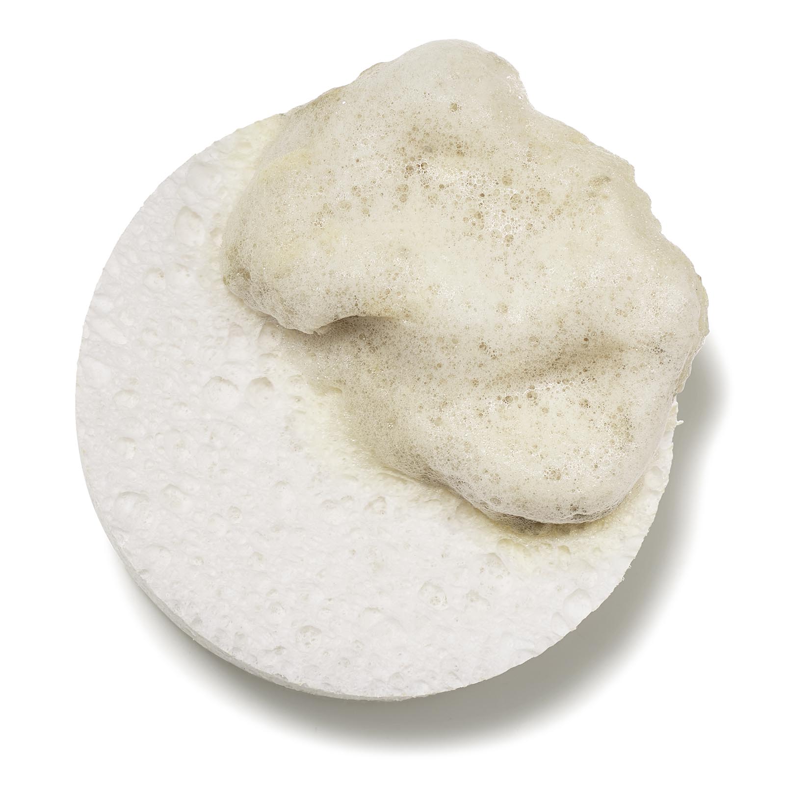 Round exfoliation sponge included with Urban Skin RX Clear and Even Tone Body Cleansing Bar